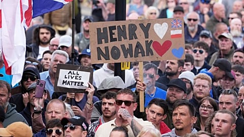 People gather to protest outside Southampton police station, Southampton, England, 2 June 2026, following the killing of Henry Nowak