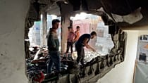 Les habitants de Gaza constatent les destructions après un raid israélien nocturne