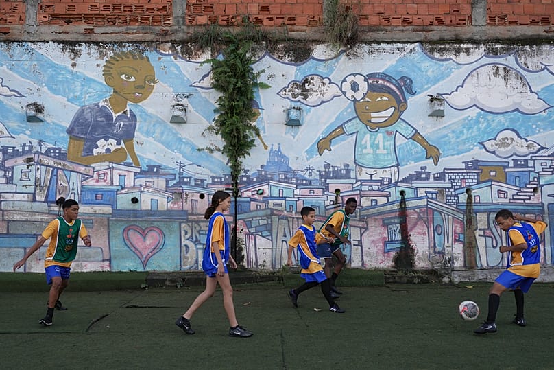 Teenagers attend a soccer training session by the Street Child United Brazil social project in the Complexo da Penha of Rio de Janeiro, Wednesday, June 3, 2026.