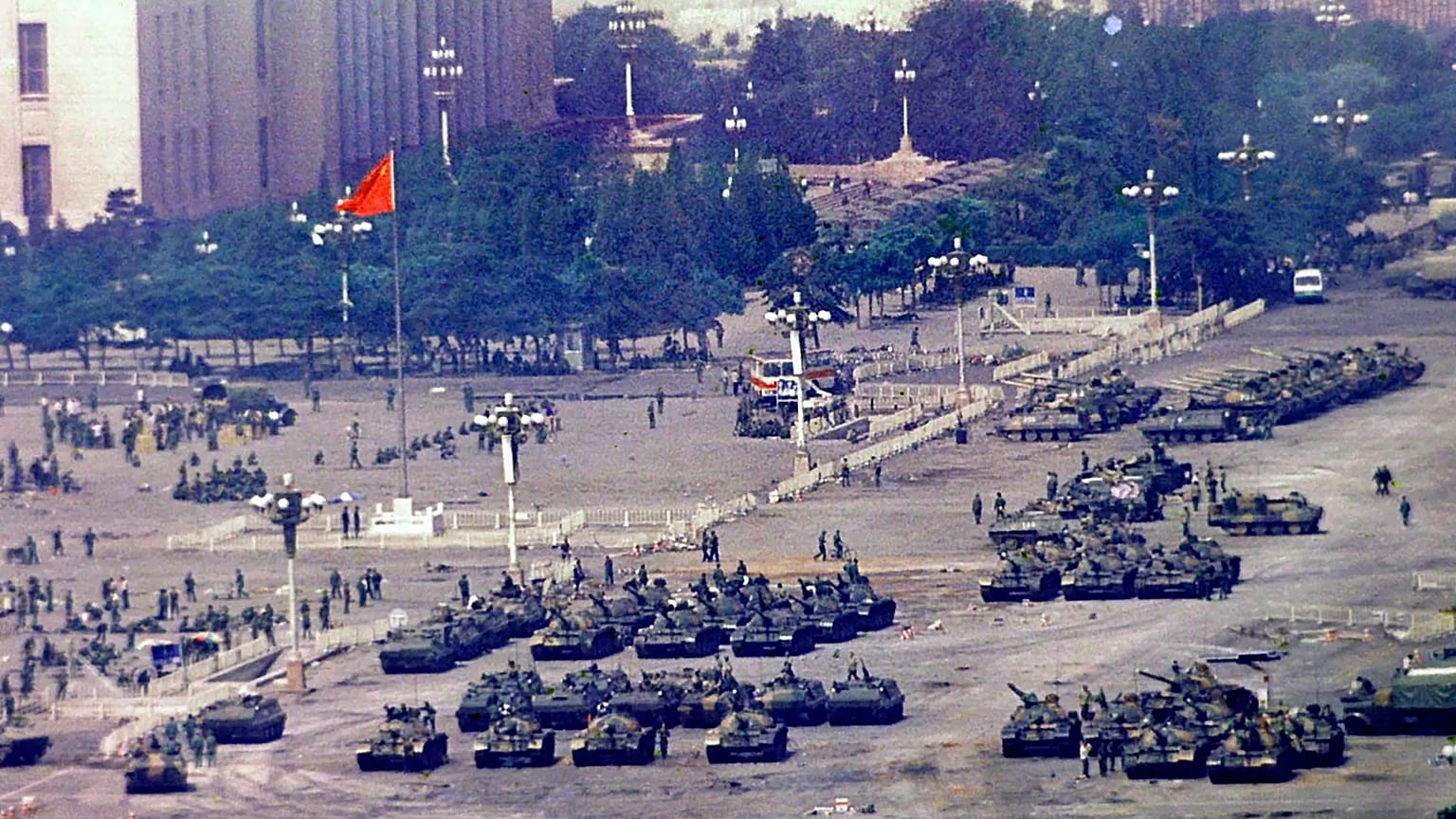Chinese troops and tanks gather in Beijing one day after the military crackdown on Tiananmen Square, 5 June, 1989