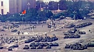 Chinese troops and tanks gather in Beijing one day after the military crackdown on Tiananmen Square, 5 June, 1989