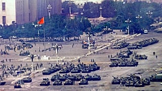 Chinese troops and tanks gather in Beijing one day after the military crackdown on Tiananmen Square, 5 June, 1989