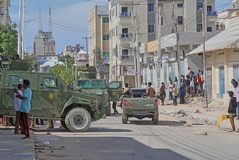 Armored vehicles carrying Somali security forces patrol a street after supporters of opposition figures and state security forces clashed in Mogadishu, Somalia, June 4, 2026