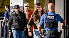 Jacques and Jessica Moretti arrive surrounded by police officers for a hearing with the public prosecutor of the canton of Valais, in Sion, Switzerland, Friday, June 5, 2026. 