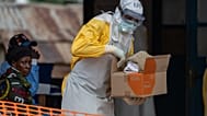 A health worker prepares for duty at the Mongbwalu treatment center in Mongbwalu, Congo. 6 June, 2026