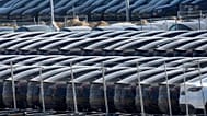 Tesla cars are parked at the new Tesla Gigafactory for electric cars in Gruenheide near Berlin, Germany, Tuesday, March 22, 2022.