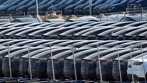 Tesla cars are parked at the new Tesla Gigafactory for electric cars in Gruenheide near Berlin, Germany, Tuesday, March 22, 2022.