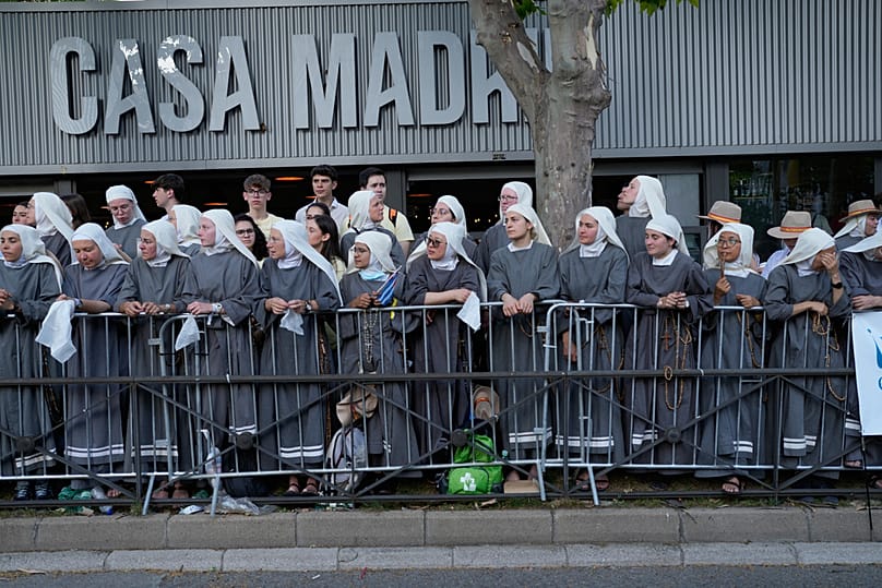 A group of nuns wait for the arrival of Pope Leo XIV during a prayer vigil with young people at Plaza de Lima in Madrid, Spain, Saturday, June 6, 2026