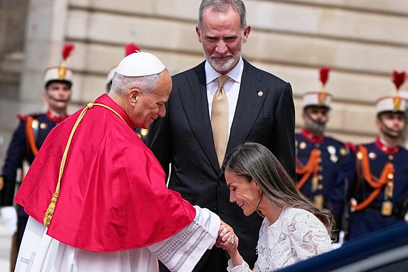 Pope Leo XIV is welcomed by Spain's King Felipe VI and Queen Letizia, as he arrives at the Royal Palace in Madrid, Saturday, June 6, 2026