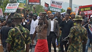 People protest demanding government to rescue the school children that were recently kidnapped in various part of the country, on the street of Abuja, Nigeria. Thursday, June 