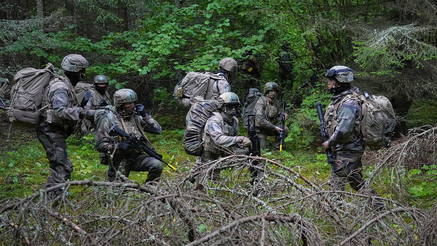 French service members participate in multinational military Exercise Pikne ("Lightning") near Valkla, Estonia, in 2025. 
