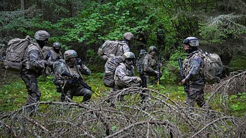 French service members participate in multinational military Exercise Pikne ("Lightning") near Valkla, Estonia, in 2025. 