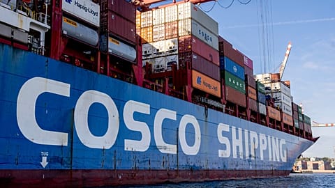 A container ship of Chinese Cosco shipping lies in the harbor in Hamburg, Germany, Wednesday, Oct. 26, 2022. 