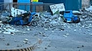 This shows vehicles damaged by debris after powerful earthquake in the Mindanao region, Philippines Monday, June 8, 2026.