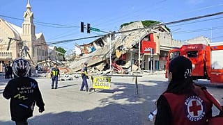 Rescuers inspect the damage after an earthquake in General Santos, 8 June, 2026