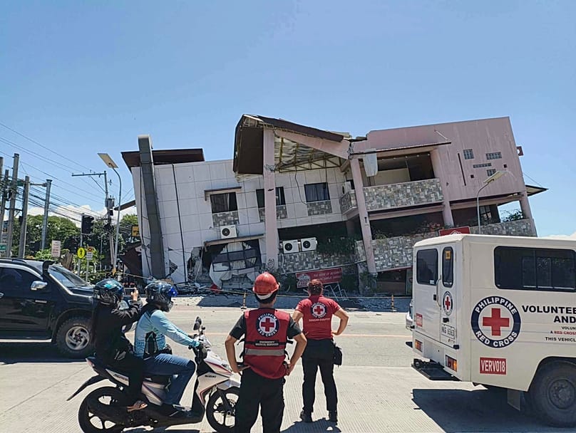 Rescuers inspect the damage after an earthquake in General Santos, 8 June, 2026