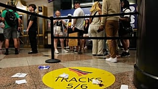 People stand near an area roped off after a stabbing at Penn Station in New York, 7 June, 2026