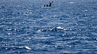 Migrants from Syria and Libya call for help as they are assisted by Spanish NGO Open Arms in the Mediterranean Sea, 10 August, 2022