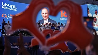Supporters of Armenia's ruling Civil Contract party leading by Prime Minister Nikol Pashinyan hold up heart signs while gathering in Republic Square in Yerevan, 5 June, 2026