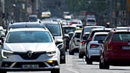 Road users cross a junction at the 'Leipziger Strasse' (Leipzig Street) in Berlin, Germany, Thursday, June 10, 2021. 
