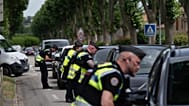 Police inspect vehicles during the search for evidence in the case of missing 11-year-old Lyhanna in Fleurance, southwestern France, 5 June 2026. 