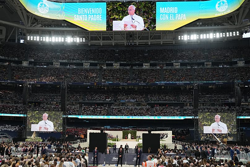 Pope Leo XIV delivers his message during a meeting with the diocesan community at the Santiago Bernabeu stadium in Madrid, Spain, Monday, June 8, 2026 