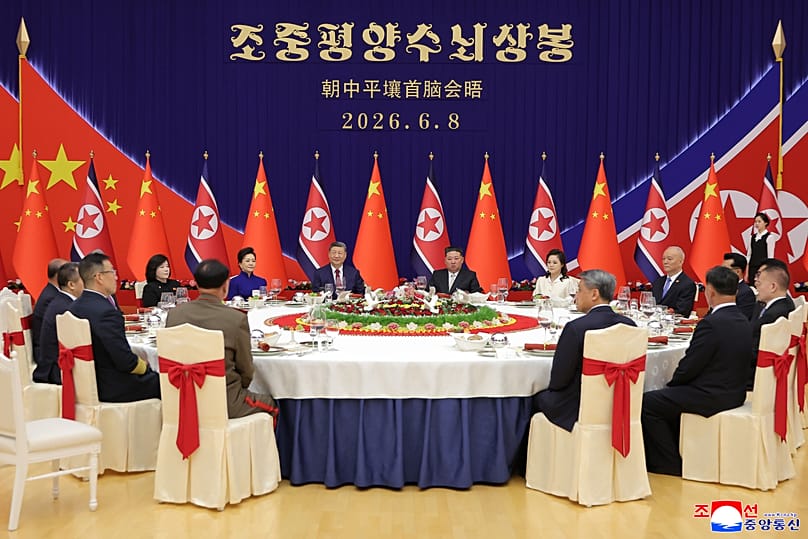 North Korean leader Kim Jong Un and Chinese President Xi Jinping attend a dinner in Pyongyang, Monday, June 8, 2026.