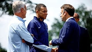 FILE -  French President Emmanuel Macron meets Kylian Mbappé and manager Didier Deschamps in Clairefontaine, 3 June 2024