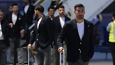 Iran's Ehsan Hajisafi, right, arrives with his teammates for the World Cup soccer tournament in Tijuana, Mexico, Sunday, June 7, 2026. (AP Photo/Gregory Bull)