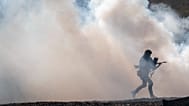 A Lithuanian Army soldier takes part in a military exercise near the Suwalki Gap near the Polish border at the Dirmiskes village, in Lithuania on Friday, April 26, 2024. 