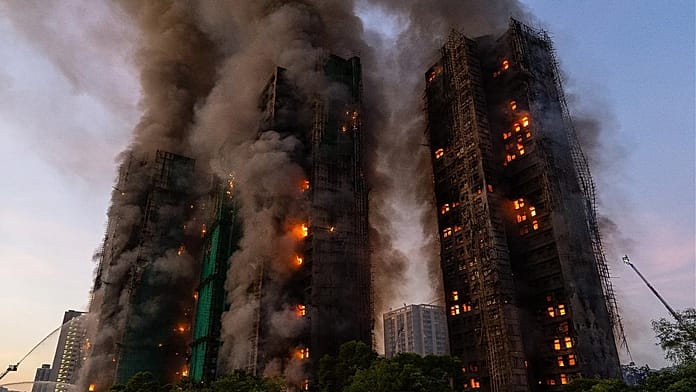 Hong Kong charges seven people and two firms over massive fire that killed 168