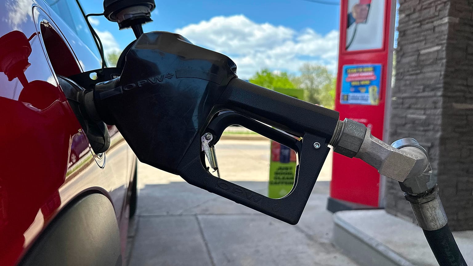 File - A pump fills up the tank of a vehicle at an Exxon gasoline station in Litttleton, Colo., Tuesday, 12 May 2026. 