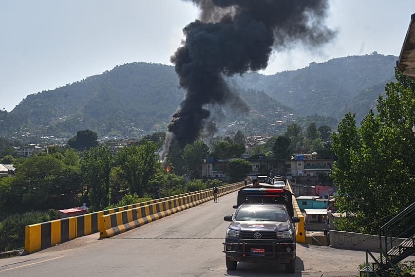 Smoke billows after an army MI-17 helicopter crashed due to a technical fault in Muzaffarabad, 10 June, 2026