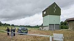 French police guard a farm silo where a body was found during the search to find missing 11 year-old girl in Puycasquier, 5 June, 2026