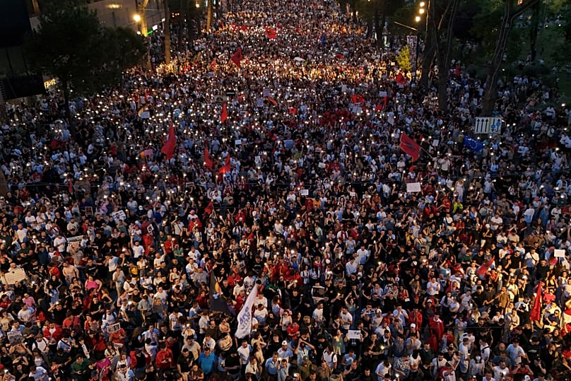 Protesters take part in a rally in Tirana, 9 June, 2026