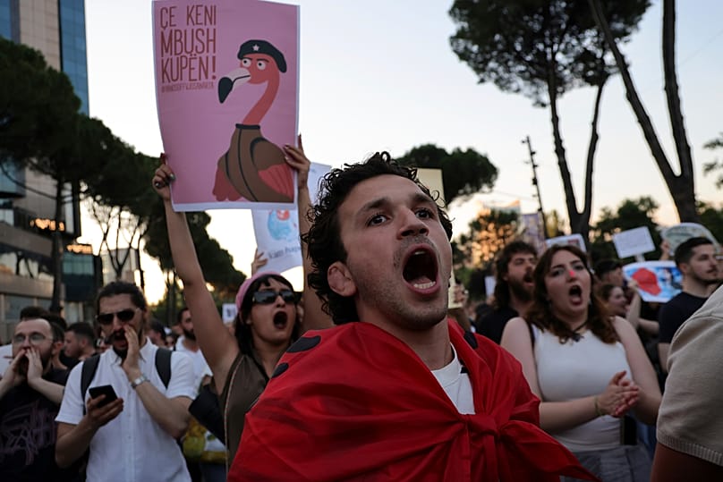 Protesters take part in a rally in Tirana, 9 June, 2026