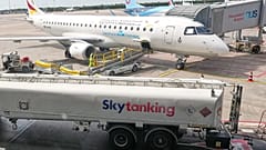 Jet fuel is transported by tank trucks to aircrafts at the airport in Duesseldorf, Germany, when airlines fear a kerosene shortage due to the war in Iran, April 27.