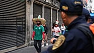 Fans arrive to a fan zone prior to the opening match of the 2026 FIFA World Cup between Mexico and South Africa 
