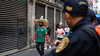 Fans arrive to a fan zone prior to the opening match of the 2026 FIFA World Cup between Mexico and South Africa 
