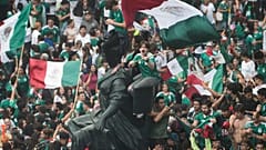 Des supporters célèbrent la victoire du Mexique sur l’Afrique du Sud lors du match d’ouverture de la Coupe du monde de football à Mexico