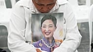 A person holds a picture of the late Thailand Princess Bajrakitiyabha Mahidol in Bangkok, Thailand. 12 June, 2026. 