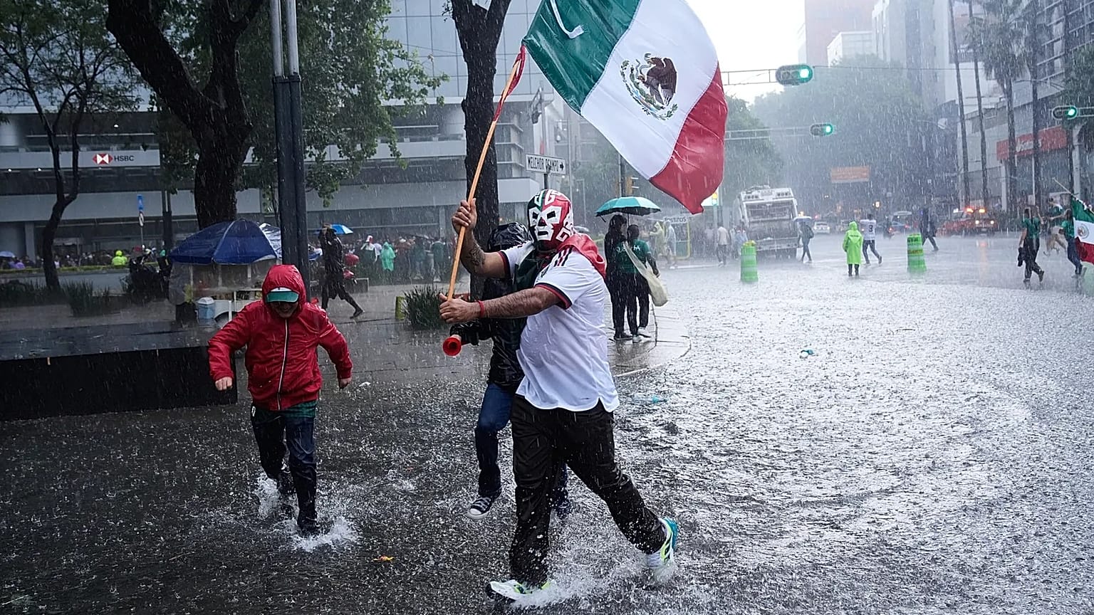 Fans celebrate after Mexico defeated South Africa in the opening match of the soccer World Cup in Mexico City, Thursday, June 11, 2026.