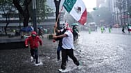 Fans celebrate after Mexico defeated South Africa in the opening match of the soccer World Cup in Mexico City, Thursday, June 11, 2026.