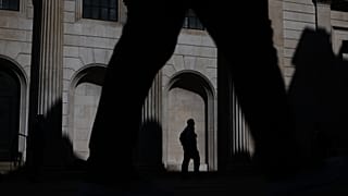 Pedestrians walk past the Bank of England in London, 30 April 2026