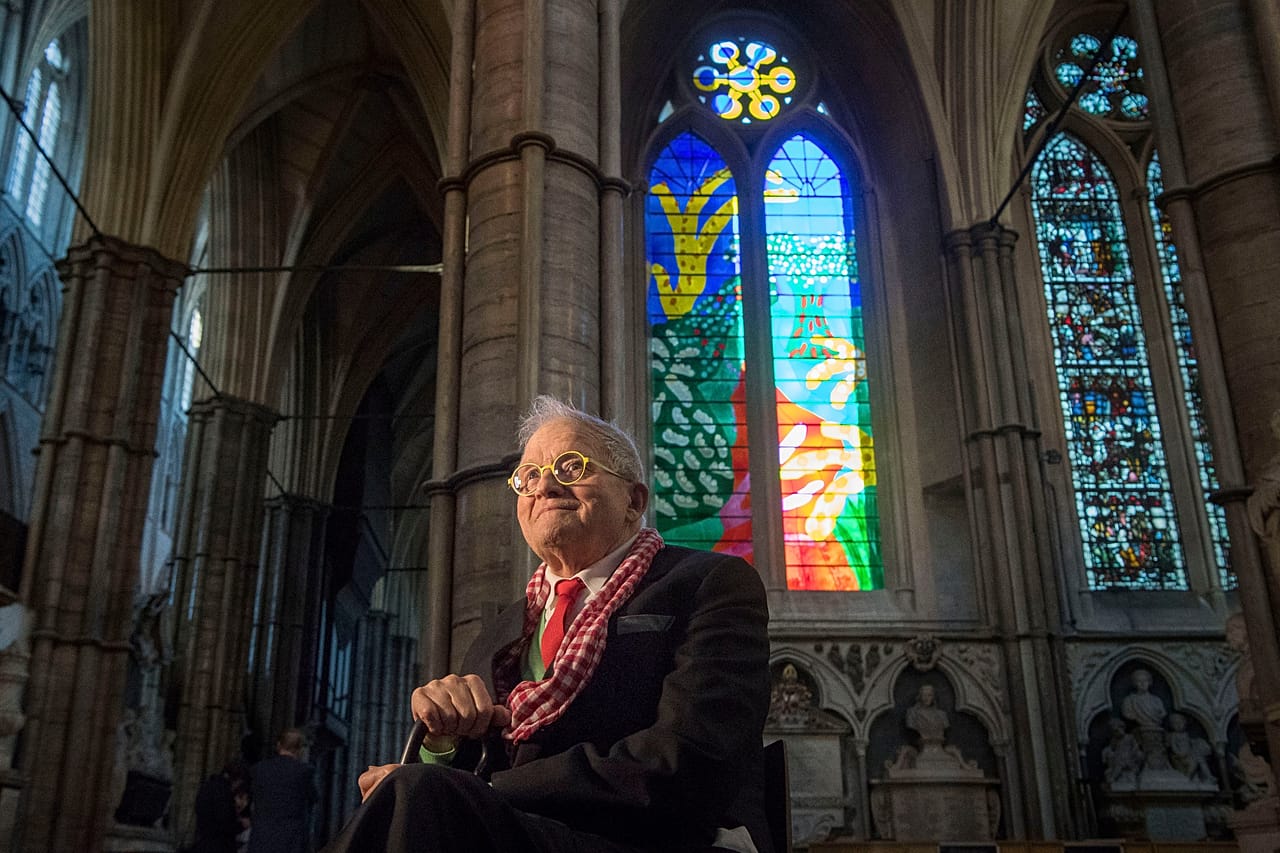 FILE: David Hockney sits in front of The Queen's Window, a new stained glass window at Westminster Abbey, London, designed by David Hockney, 2018. 