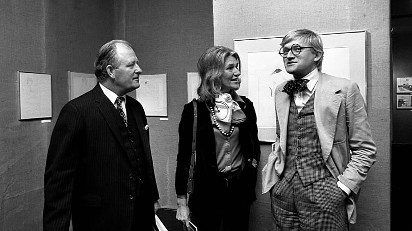 Hockney pictured with British Ambassador Edward Tomkins, left, at the opening of his exhibition at Musee des Arts Decoratifs on Oct. 10, 1974 
