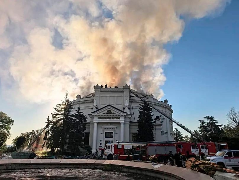 FILE:In this photo provided by Russian occupation authorities firefighters put out a blaze after a Ukrainian drone hit a building in Sevastopol, Crimea, Ukraine, June 10, 2026