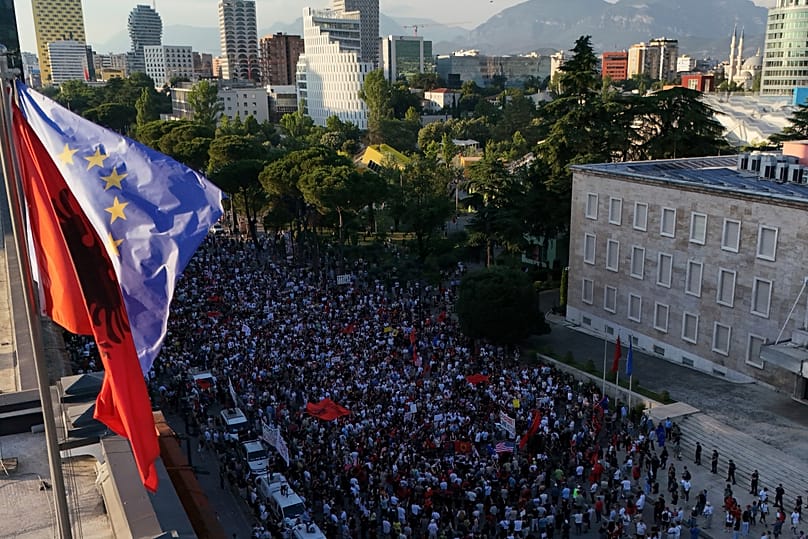 Protesters take part in a rally in Tirana, Albania, Tuesday, June 9, 2026, against the construction of a massive coastal development project.