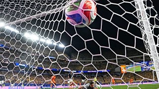 Ecuador goalkeeper Hernan Galindez looks around as Ivory Coast's Amad Diallo scores the opening goal during the World Cup Group E soccer match between Ivory Coast, 14 June.
