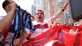 Turkish fans cheer as the team arrives at their hotel in Vancouver, British Columbia, Thursday, June 11, 2026.